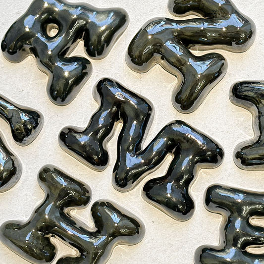 Ceramic Bubbly Letters in Metal